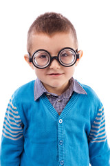 Portrait of a cute little boy wearing funny glasses