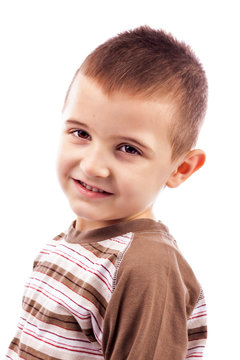 Closeup portrait of a happy cute little boy