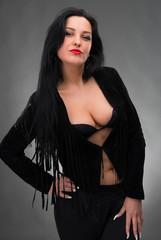Naklejka premium Portrait of sexy woman in black dress