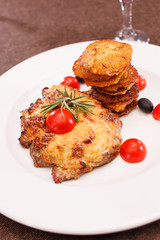 meat with potato pancakes