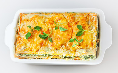 italian lasagna on a square plate
