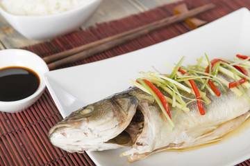 Chinese style steamed sea bass with ginger, chili & spring onion