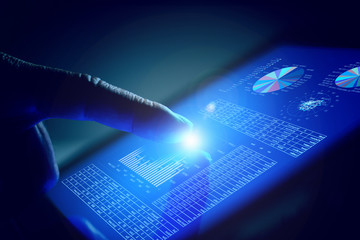 Closeup of finger touching tablet-pc screen
