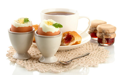 Light breakfast with boiled eggs and coffee, isolated on white