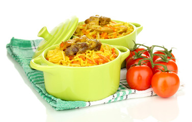 Delicious pilaf with vegetables isolated on white