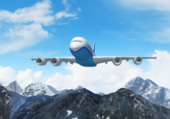 Fototapeta premium White passenger plane above the mountains