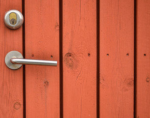 Door handle on old wooden door