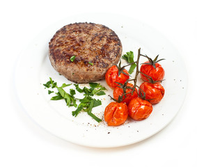 Beef steak and baked tomatoes