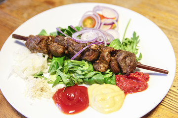 Pork shashlik (skewer) with bread