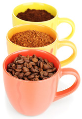Different types of coffee in three cups isolated on white