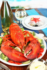 Red lobster on platter on serving table close-up