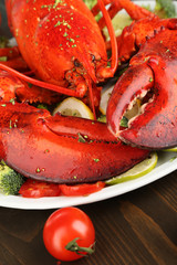 Red lobster on platter on table close-up