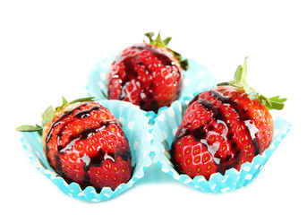 Tasty strawberry in chocolate isolated on white