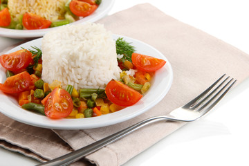 Delicious risotto with vegetables isolated on white