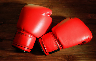 Boxing gloves on wooden background