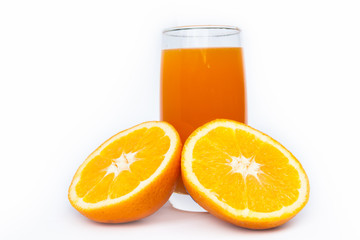 glass of orange juice on white