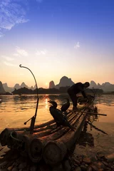 Gordijnen Boat with cormorants birds, traditional fishing in China use tra © snvv