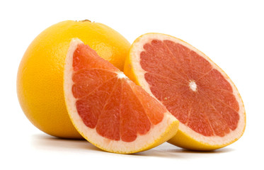 Cut grapefruit isolated on white background