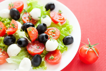 Caprese salad with mozzarella balls