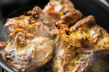 Chicken on frying pan