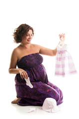 Beautiful pregnant woman - isolated over a white background