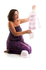 Beautiful pregnant woman - isolated over a white background