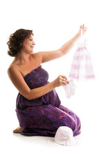 Beautiful pregnant woman - isolated over a white background