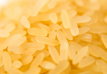 Pile of long grain brown rice close-up