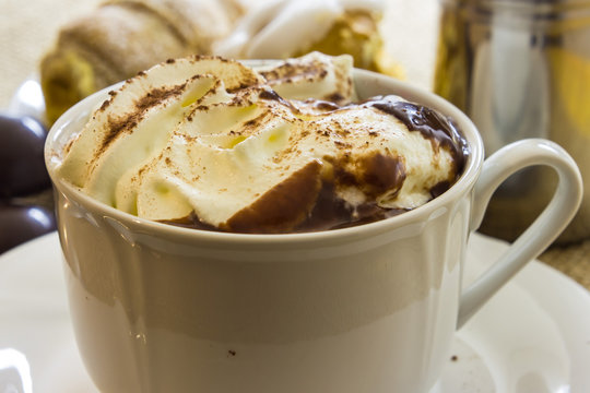 Hot chocolate cup with whipped cream