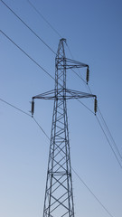 high voltage electrical towers in line - obrazy, fototapety, plakaty