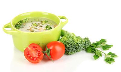 Diet soup with vegetables in pan isolated on white