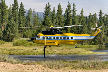 Helicopter helping to put out fires
