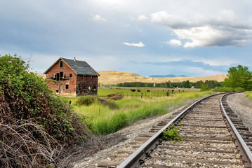 Old house and railroad tracks