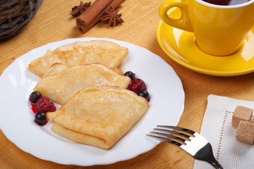 Fried pancakes with fruit