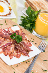 Heap of fried Bacon on a plate