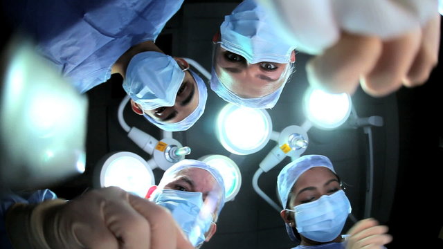 Male Female Medical Team Operating Room Head Shoulders