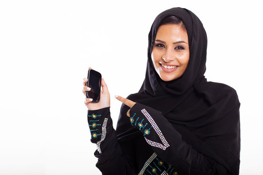 middle eastern woman pointing at smart phone