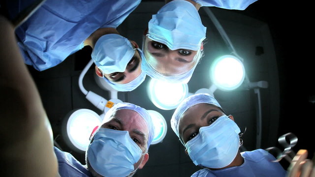 Doctors Nurses in Hospital Operating Room Faces Hands