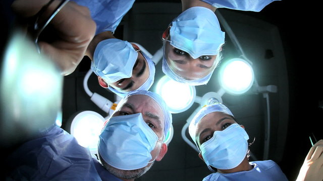 Surgical Team in Operating Theater Patient Close Up POV