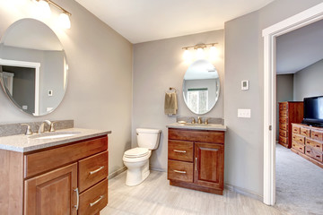 Fototapeta na wymiar Beautiful grey new modern bathroom interior.