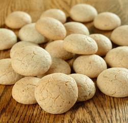 Italian amaretti cookies on a brown table