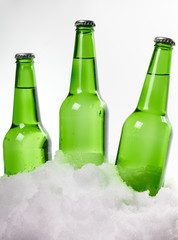 beer bottles in snow