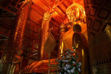 Golden buddha image in temple, Bangkok, Thailand