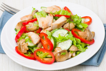 salad with chicken, mushrooms and vegetables