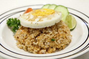 Salmon fried rice and egg on top