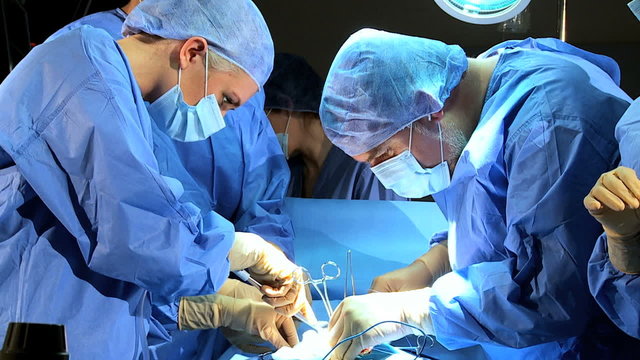 Surgeon Assisted by Medical Students Training