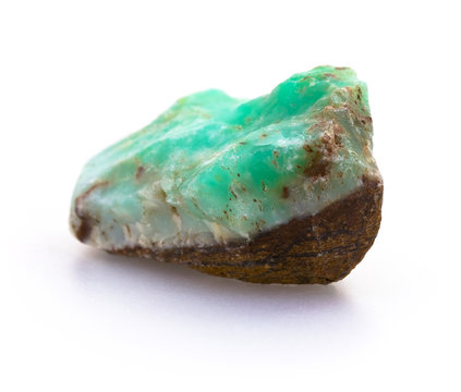 Natural rough chrysoprase gem stone isolated on white