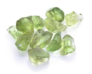 Rough green amethyst gems isolated on white background