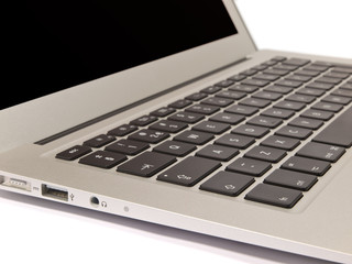QWERTY Keyboard of a Modern Slim Laptop  on White Background