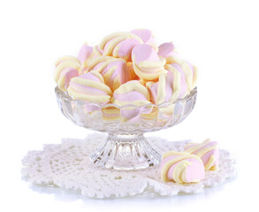 Gentle marshmallow in glass vase isolated on white